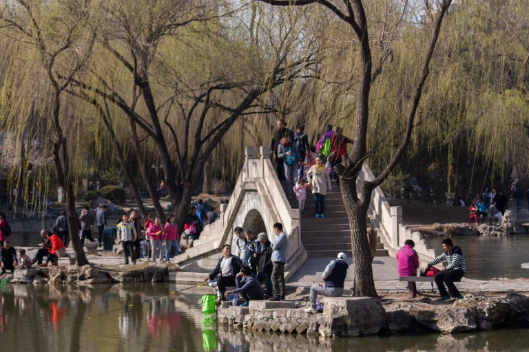 People enjoying a park in the Beijing spring. Photo © Timothy Van Gardingen