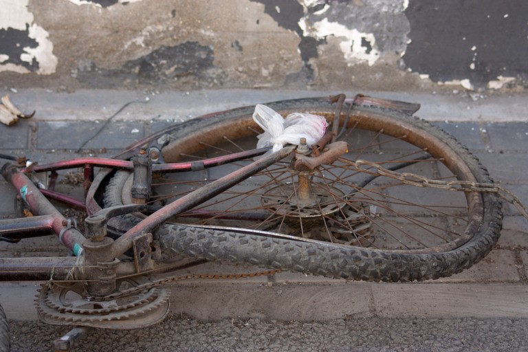 This Beijing bicycle has definitely seen better days. © Timothy Van Gardingen