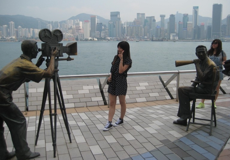 Tourists getting their 15 seconds of the "Hong Kong Dream." (Photo: Ana Ribeiro)
