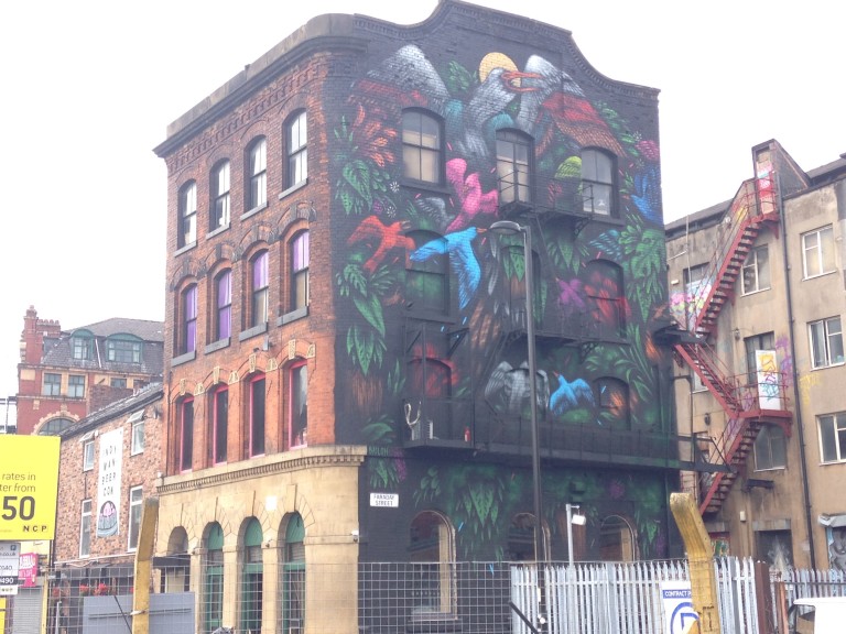 Urban art on a Manchester building facade on Port Street. Art by Mateus Bailon. Photo: Ana Ribeiro