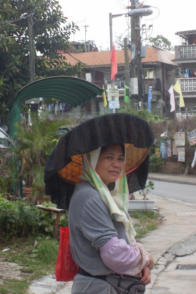Lady in a Tang hat. (Photo: Helena Flam)