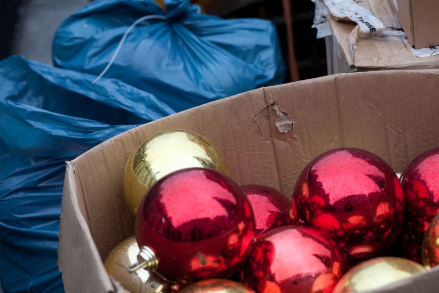 The red and gold ornaments for the Christmas tree as they are being unpacked. (Photo: Maeshelle West-Davies)