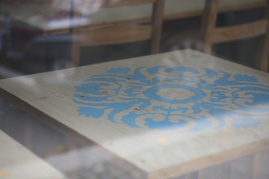 Table seen through window of the former Poniatowski. (Photo: Maeshelle West-Davies)