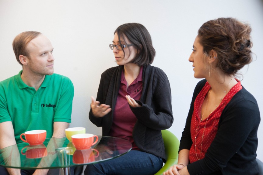 inlingua Director of German Studies Max Hündorf, Director of Studies Andréanne Roy, and School Director Carina Duteloff chatting in the language school's cafeteria. (Photo: maeshelle west-davies)