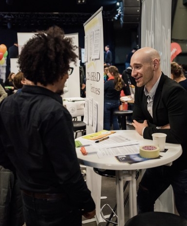 People networking at the Leipzig Glocal Job Fair last year. Photo © 2018 by Justina Smile Photography