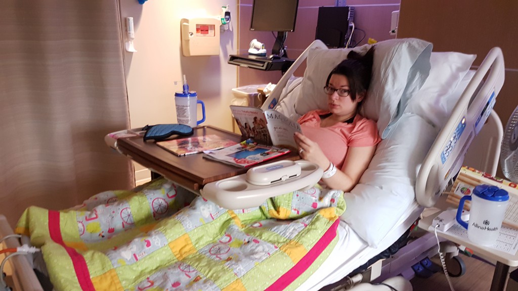 Becky waiting in bed rest at the hospital.