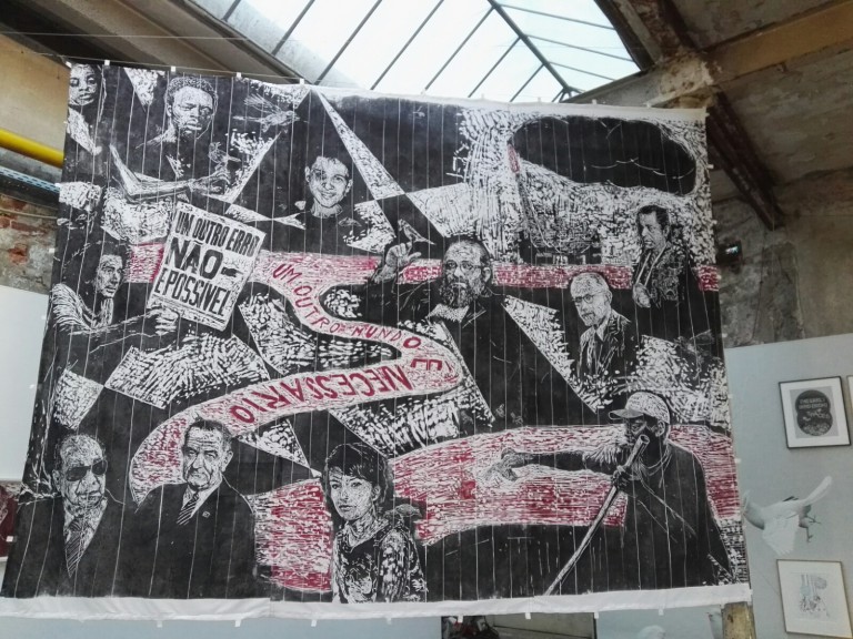 At WERKSCHAU exhibit: "another world is necessary - or: don't think about the crisis - fight!" Thomas Kilpper. Print on raw canvas, wood cut on the floor of the Vila Flores cultural center in Porto Alegre. (Photo: Chrissy Orlowski)