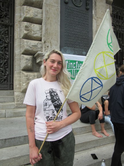 Extinction Rebellion Leipzig member Kate Tyndall at the Saturday action in front of Leipzig City Hall
