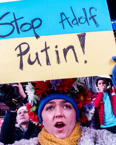 Woman with anti-Putin sign