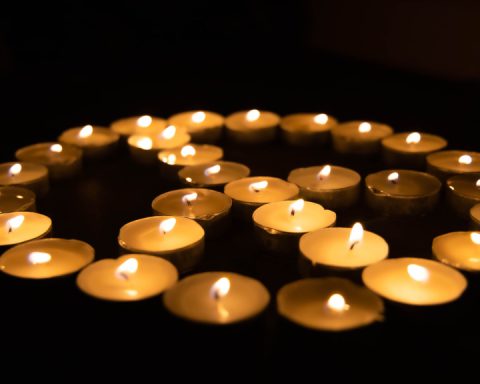 candles forming peace sign