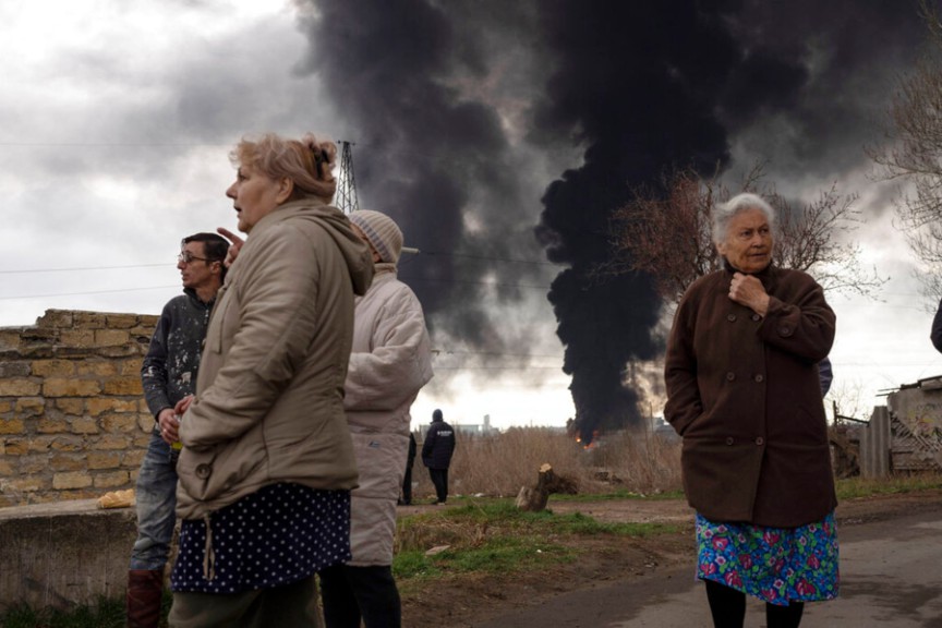 People watch bombing