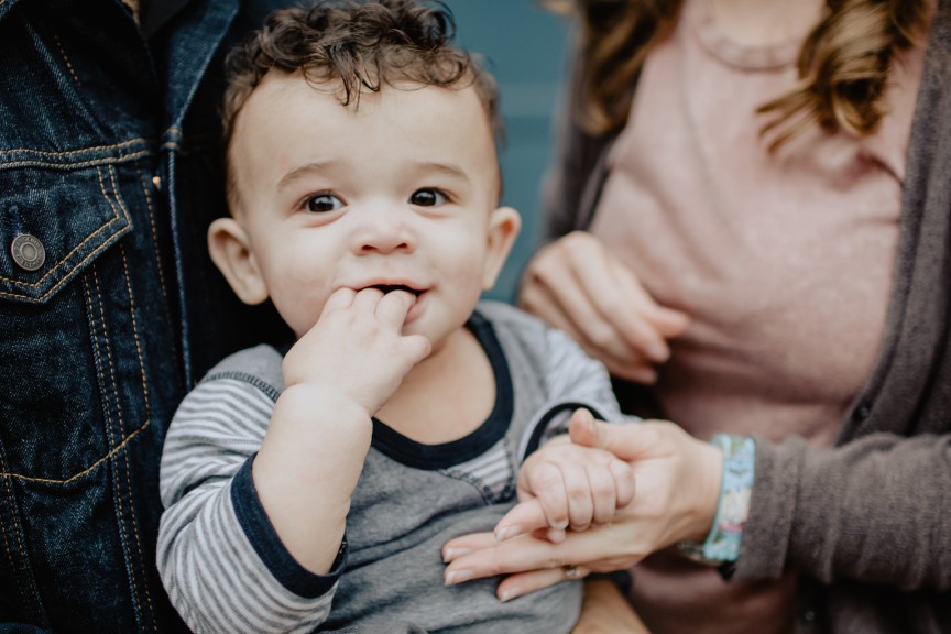 toddler with parents