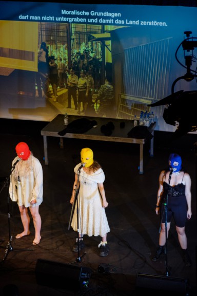 Four female performers on stage