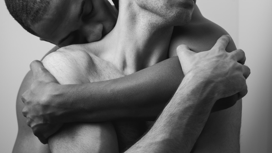 Two men embracing