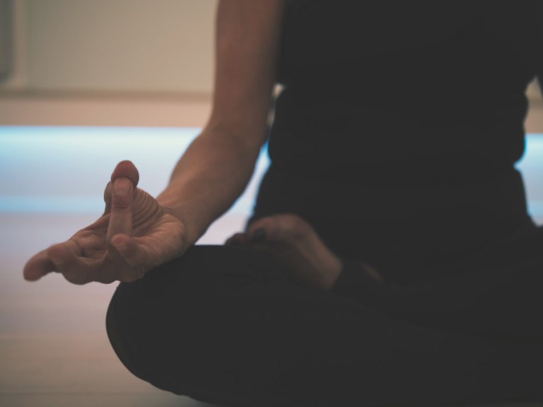 Close up view of woman meditating